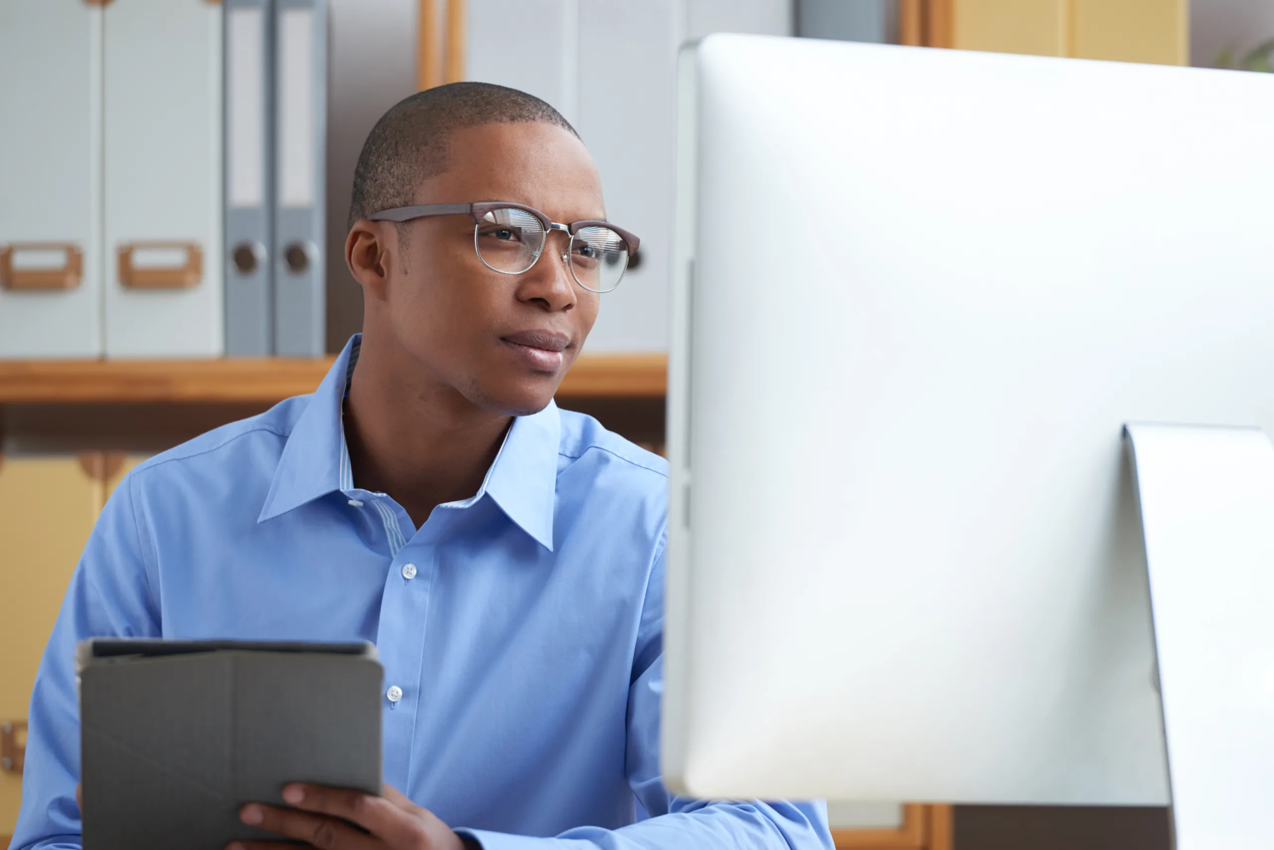 School administrator using school management software to plan for the new term
